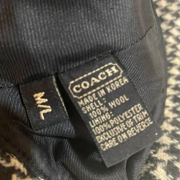 Coach houndstooth fabric hat with leather trim exterior wool lining polyester
